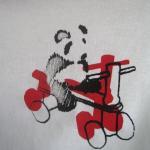 panda on red tricycle - tod..